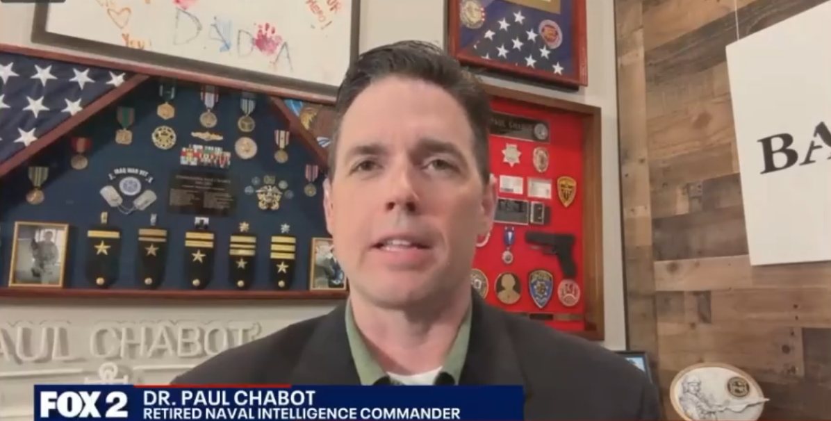 Dr. Paul Chabot on television as a retired Naval Intelligence Commander
